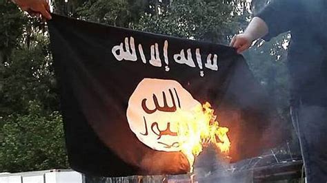 curfew in jammu town as vhp activists burn isis flag