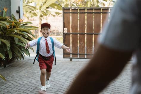 Exciited Elementary Student Coming Back Home Stock Image Image Of