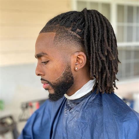 Low Fade Haircut With Dreads 50 Slick Taper Fade Haircuts For Men