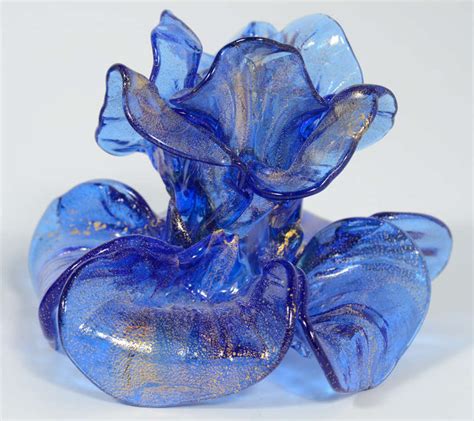 Glass sculptures, blown glass articles, bowls, centerpieces, vases, plates, goblets, glassware, millefiori glass, venetian beads, jewelry, venetian mirrors, chandeliers, table lamps and more. Stylized Flower Form Hand Blown Murano Glass Candle ...