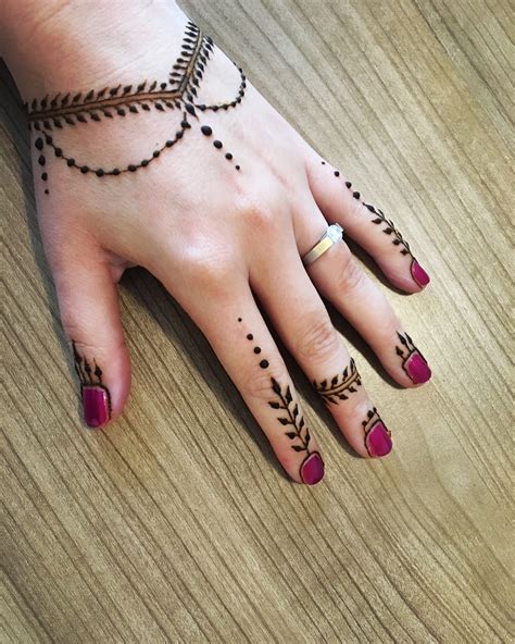 Henna Tattoo Finger At Tattoo