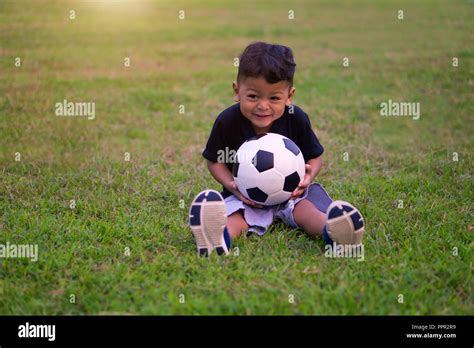 Asian Kids Playing Football Hi Res Stock Photography And Images Alamy