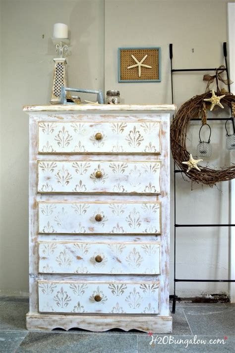 Chest is freshly lacquered in a shiny white. White and Gold Distressed Damask Dresser | Distressed dresser, Stencil dresser, Dresser