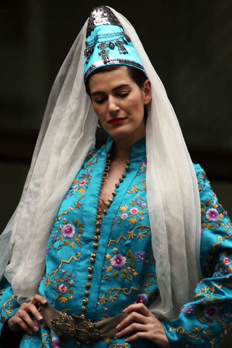Turkish Woman In Ottoman Costume Evil Eye Necklace Draped Over Her Hat