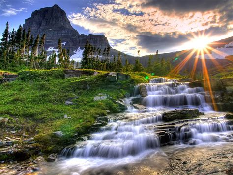 Sunset At A Cascading Waterfall Wallpapers And Images Wallpapers