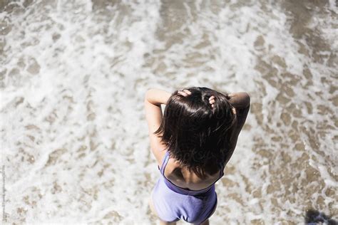 Woman Standing In Bathing Suit Del Colaborador De Stocksy Pink House Organics Stocksy