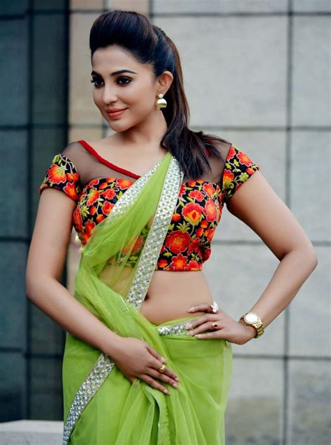 tamil actress parvathi nair looking hot in green saree cinehub