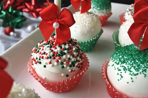 It's definitely easier to make a cake, frost it, and sprinkle on some sprinkles. Festive Christmas Cake Pops Recipe for the Holidays | Foodal