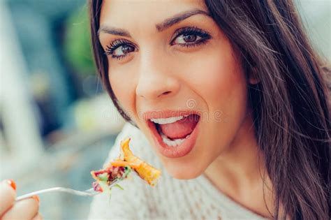 Young Woman Enjoying Food In A Restaurant Having Her Lunch Break Stock Image Image Of Fancy