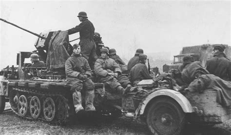 A Demag Sdkfz 105 With Its Mounted 20mm Flak 38 Towing A Ammunition