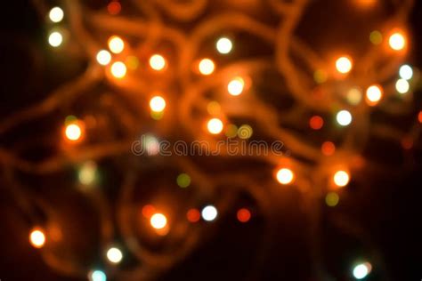 Abstract Blurry Small Light Glowing In The Dark Night Background Stock