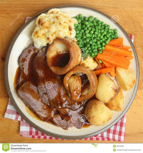When it comes to presenting that meal, most people just want their food without dealing with any kind of fanfare that complicates everything. Sunday Roast Beef Dinner stock photo. Image of gratin ...
