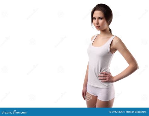 Young Slim Woman Body With White Cotton Panties And Shirt Isolated On