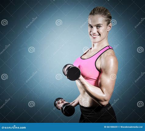 Composite Image Of Muscular Woman Lifting Heavy Dumbbells Stock Image