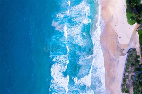 Aerial View Sandy Beach And Big Waves Crashing On Sandy Shore