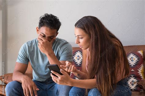 Infidelity Jealous Girlfriend Showing His Cheating Boyfriend His Phone Demanding Explanation