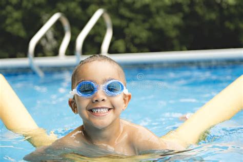 Portrait Of Twin Brother Boy Having Good Time In Swimming Pool Stock