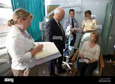 Consultation On Ward Round With Junior Doctors Stock Photo Alamy