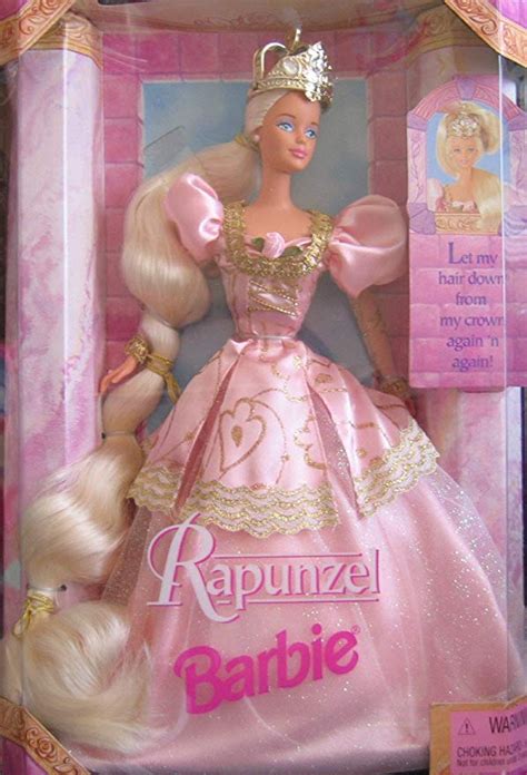 The Barbie Doll Is Wearing A Pink Dress And Tiara