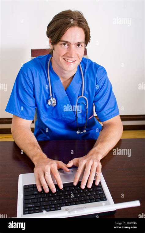 Male Doctor Working On Laptop Computer Stock Photo Alamy