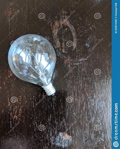 Light Bulb On Table Stock Image Image Of Glass Snow 203815487