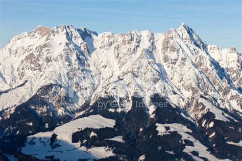 Snow Covered Mountain Range In The Austrian Alps Stock Photo Royalty