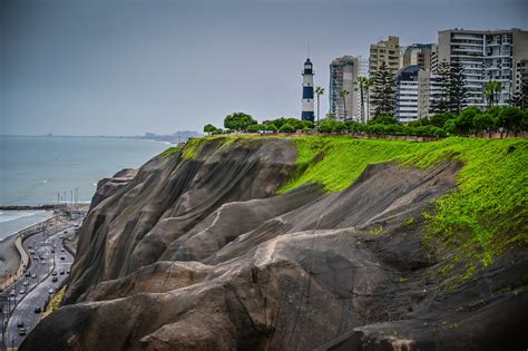 Coastal Cliffs Of Miraflores Lima Peru With Faro La Marina Flickr