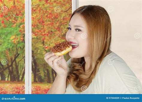 Overweight Woman Eating Donut Stock Image Image Of Home Looking