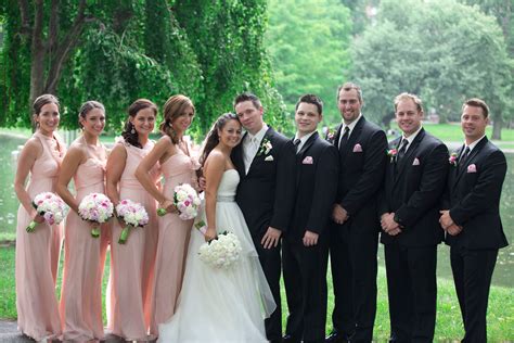 Pale Pink Bridesmaids Dresses And Black Groomsmen Tuxedos Pink