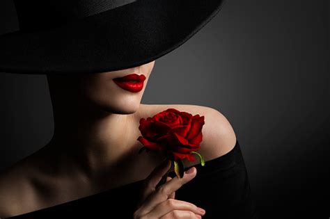 Woman Red Lips And Rose Flower Fashion Model Beauty Portrait In Black