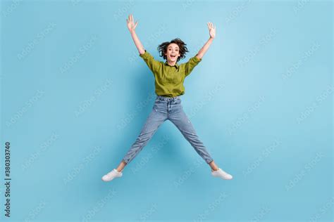 Photo Portrait Of Young Brunette Girl Jumping Up Spreading Legs Arms