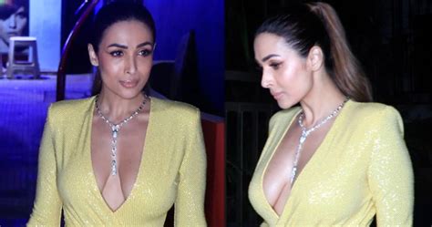 malaika arora flaunts her sexy cleavage in extreme plunging gown