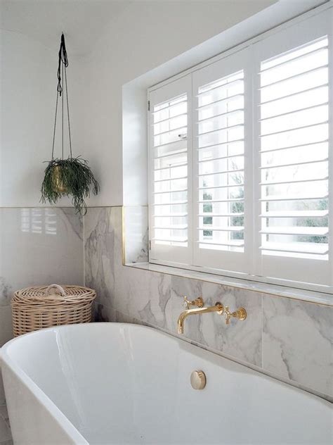 Plantation shutters are a great window treatment. 25 Window Treatments That Are Trending Right Now - DigsDigs
