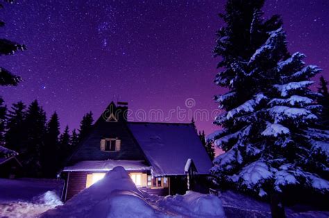 Milky Way Galaxy Purple Night Sky Stars Above Mountains Stock Photo