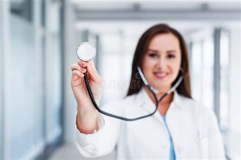 Young Female Doctor Holds Stethoscope Stock Photo Image Of Hand