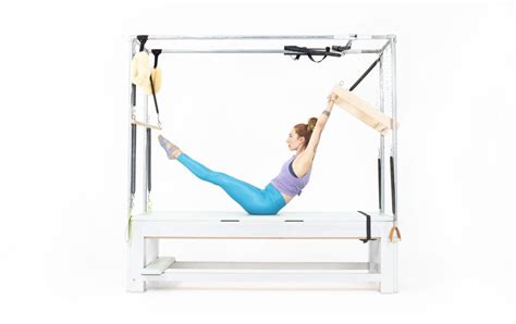 Teaser With Push Thru Bar On The Cadillac Online Pilates Classes