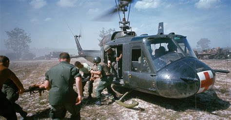American Gunners Firing From Helicopter In Vietnam 3 Vietnam War