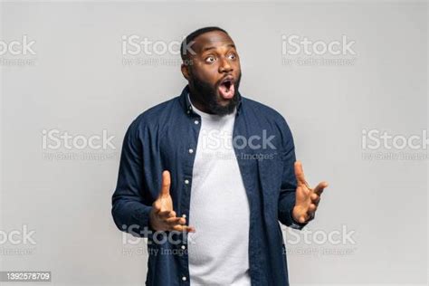 Shocked Africanamerican Guy Staring Away With Awe Expression Stock