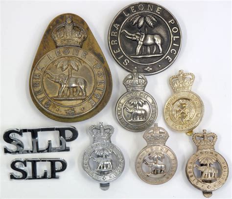 Sierra Leone Police Badges Consisting Of Belt Plate With Three Screw