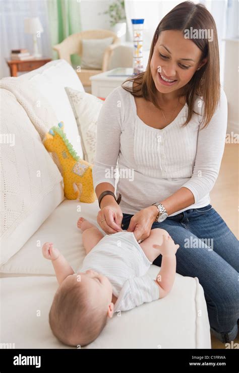 Mother Changing Babys Diaper Hi Res Stock Photography And Images Alamy