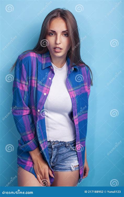 Young Pretty Girl Posing Happy Smiling On Blue Background Lifestyle People On Summer Vacation