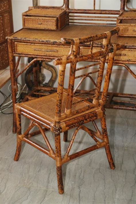 Are there any rattan bamboo dining tables left? Faux Bamboo and Rattan Chinoiserie Desk with Chair at 1stdibs