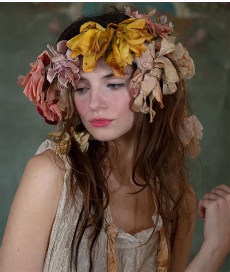 A Woman With Flowers In Her Hair