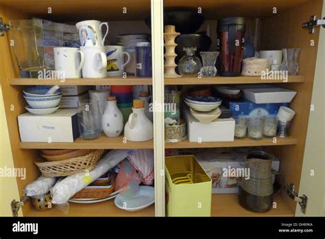 Messy Kitchen Cupboard Stock Photo Alamy
