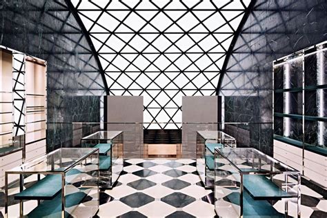 The Interior Of An Office Building With Black And White Checkerboard
