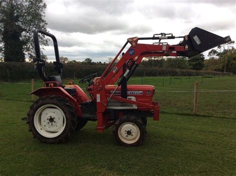 Yanmar Compact Tractor With Front Loader Bucket And Rear 3 Point