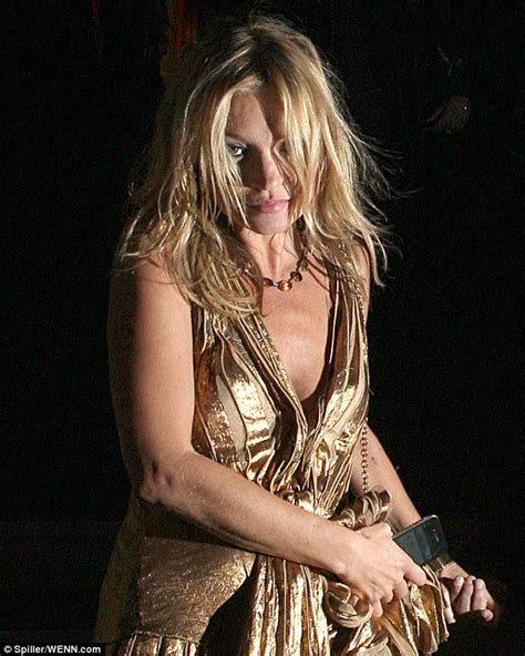 Kate Moss Golden Sheen Disperses As She Leaves Her Book Launch Looking Dishevelled Daily Mail