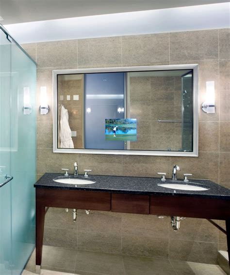 Mirrorvision® mirror tv / pc screens, also known as smart mirrors or magic mirrors, have a unique optical glass surface (lens) that enhances the we can also offer more specialist mirror television options like a bathroom tv mirror, manufactured specifically to be watertight and suitable for. Bathroom TV mirror | Bliss Bath And Kitchen