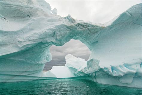 Arched Iceberg Floating Off The Western Photograph By Steven J