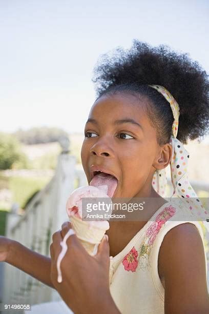girl eating messy ice cream cone stock fotos und bilder getty images